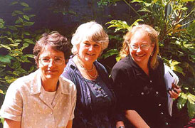 Three St Clare's teachers in the garden