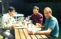 Students eating outside in sunshine at St.Clare's