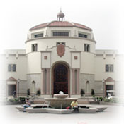 Close exterior view of the Joan B. Kroc Institute for Peace and Justice, with small fountain