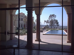 View from the Joan B. Kroc Institute for Peace and Justice of blue sky, pool and trees