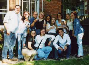 Large group of students with drinks, smiling