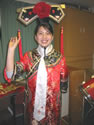 A St Clare's student in traditional costume - Chinese New Year 2003