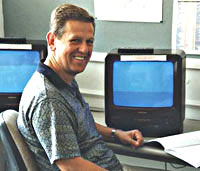 Student in audio-visual resource centre at St.Clare's