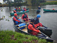 taking instruction from the canoe instructor