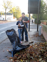 sweeping up leaves on the Banbury Road