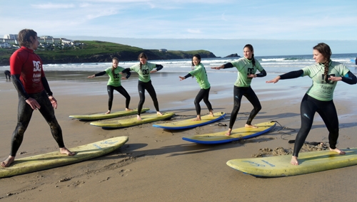 Surfing on Fistral beach in Cornwall