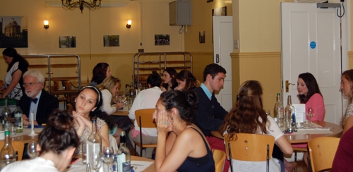 Students from Salve Regina University enjoying St. Clare's Welcome Dinner