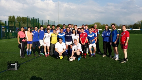 Staff and student football players at St. Clare's, Oxford