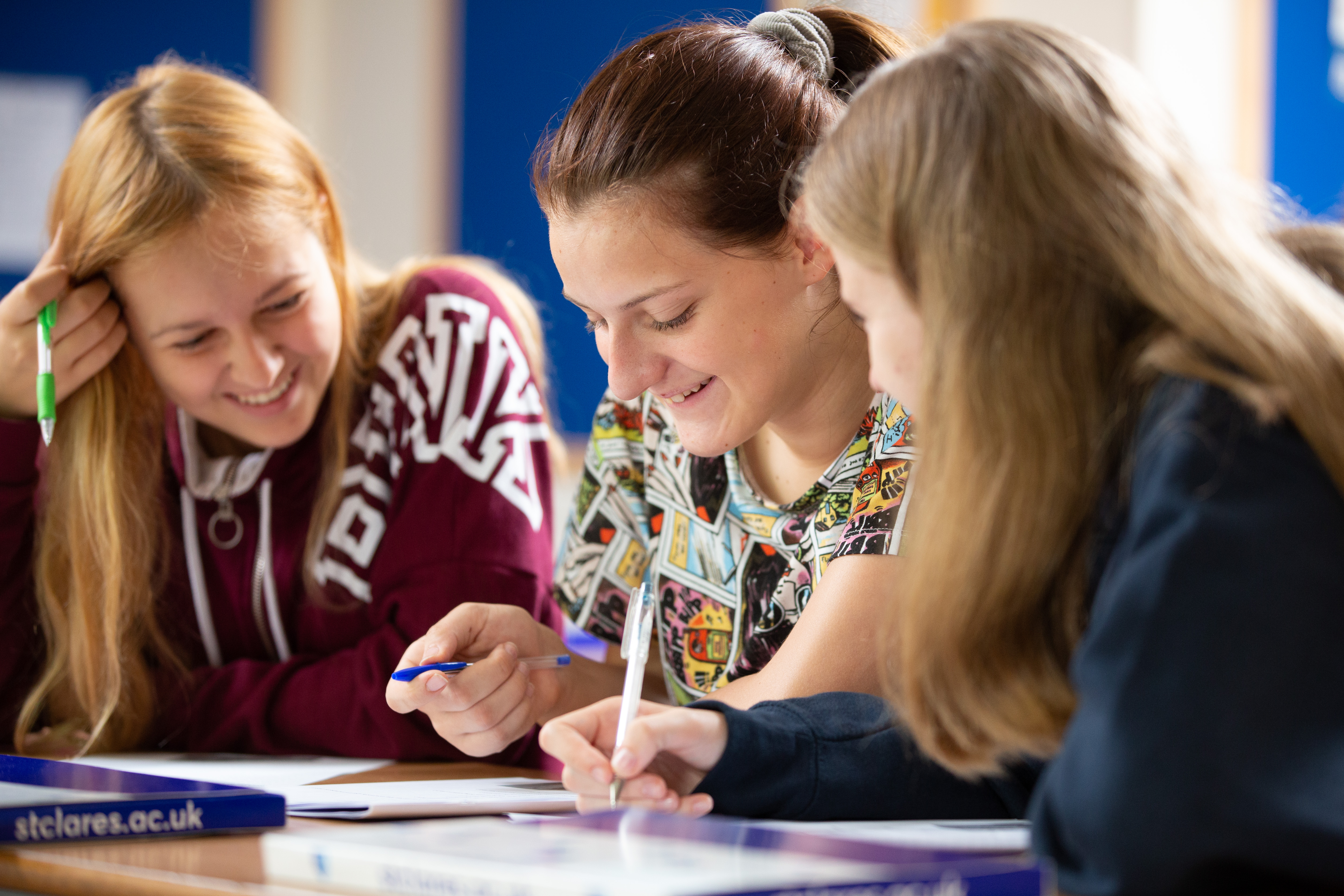 two teenage students in summer classroom lesson