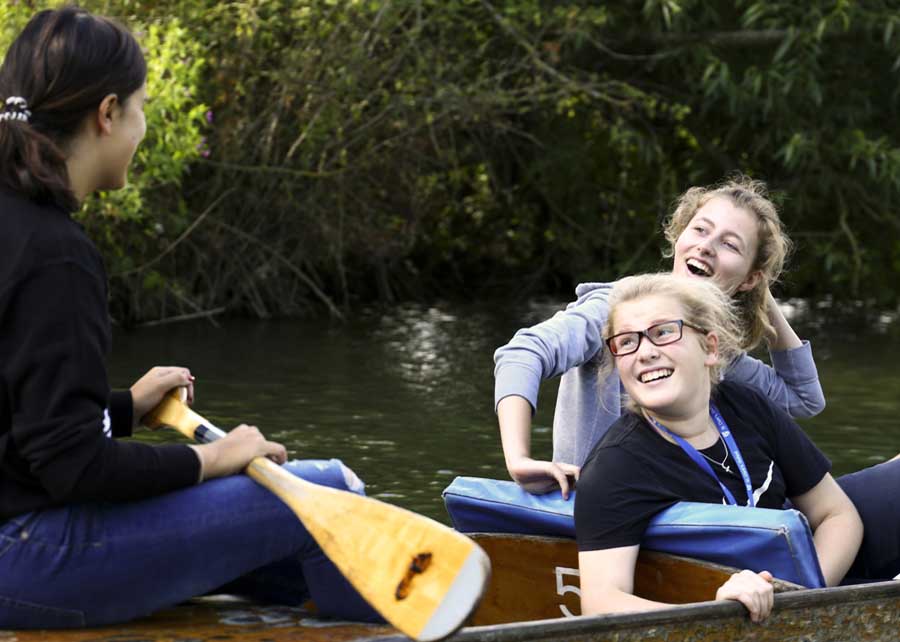 Having fun punting on the Thames