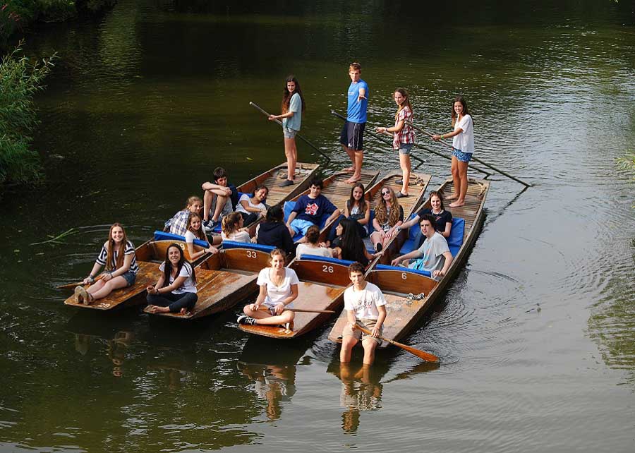 Bringing the punts together on the Thames in Oxford Floating raft of punts