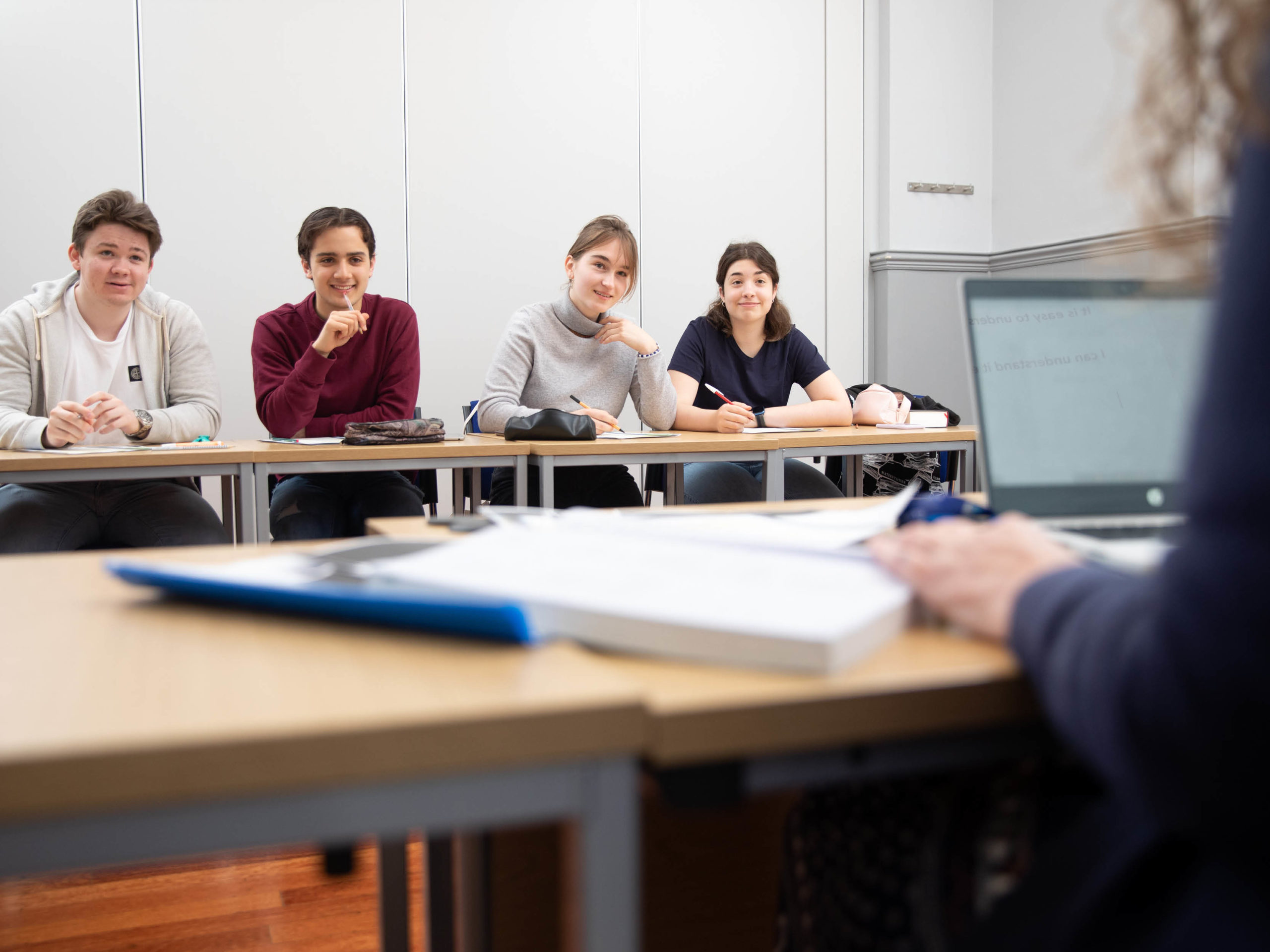 two teenage students in summer classroom lesson