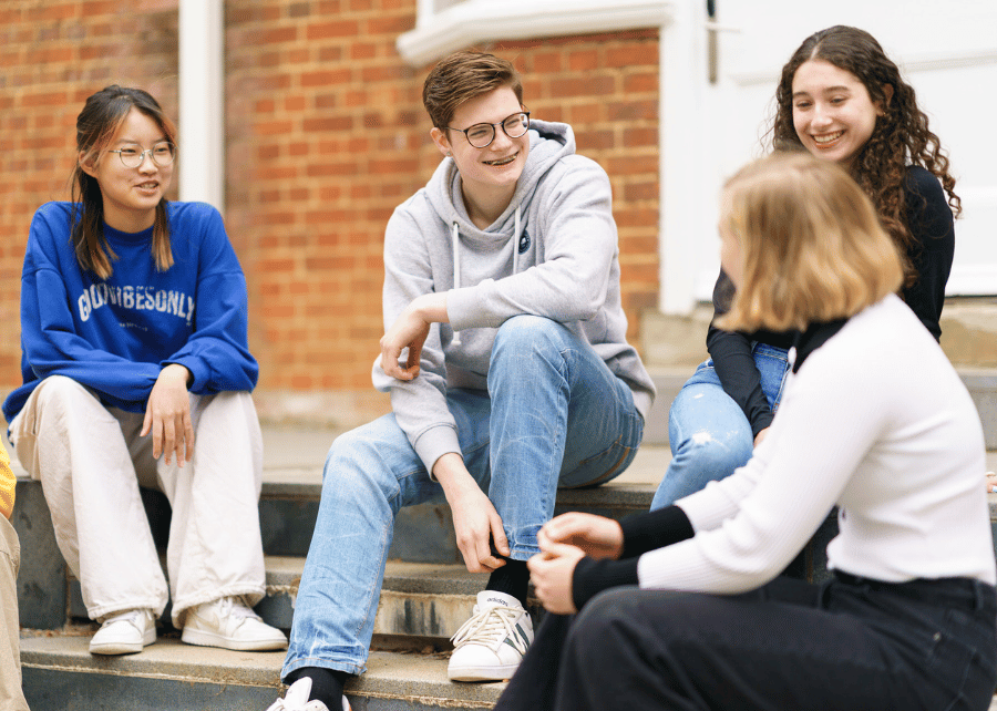 two teenage students in summer classroom lesson