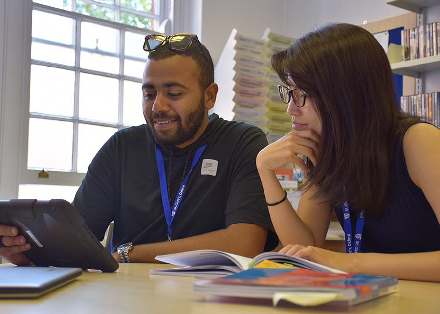 two teenage students in summer classroom lesson