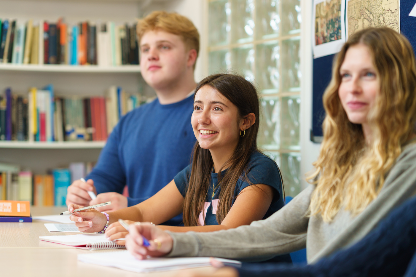 group of teenagers girls and boys in summer sunshine