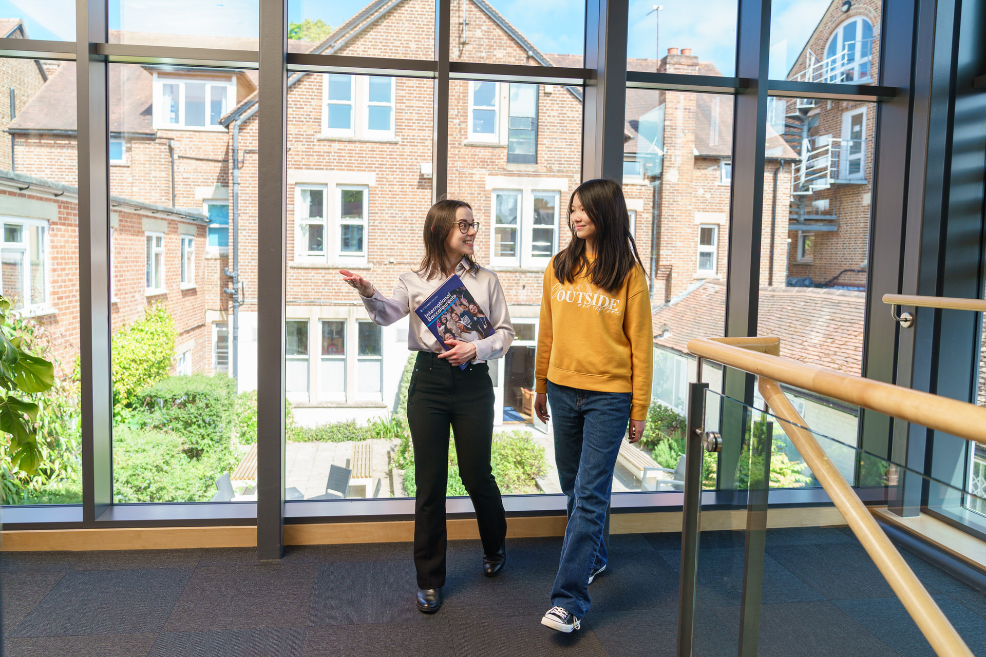 two teenage students in summer classroom lesson