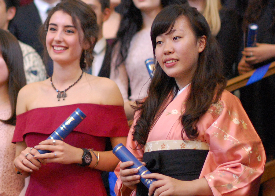 Students celebrate gaining their IB diploma. Students celebrate gaining their IB diploma.