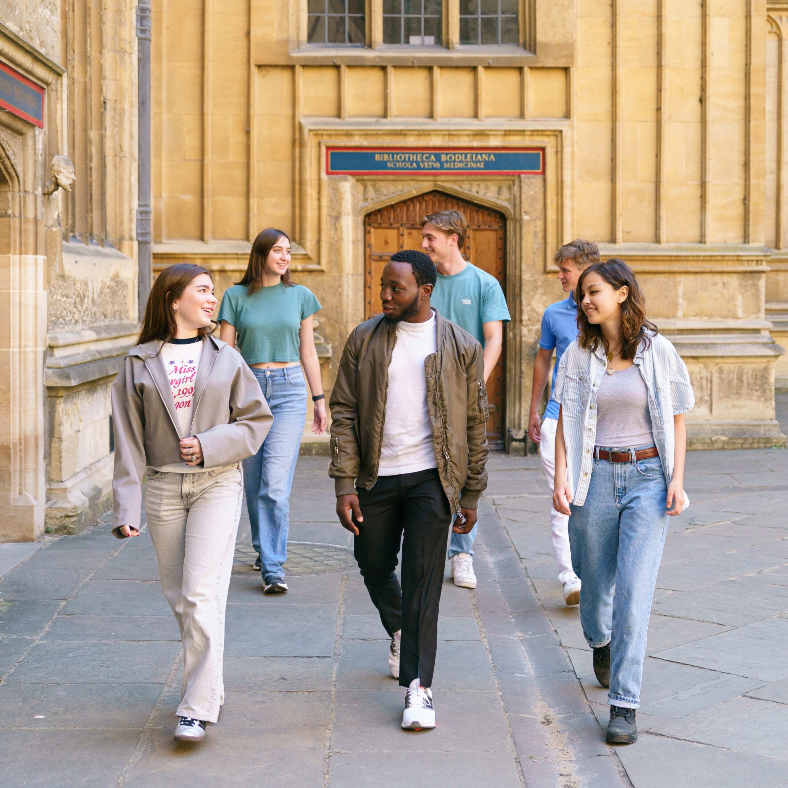 two teenage students in summer classroom lesson