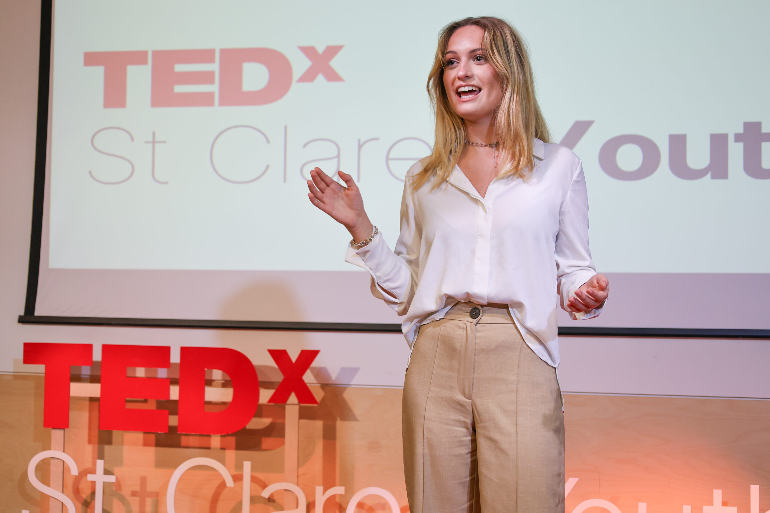 group of teenagers girls and boys in summer sunshine