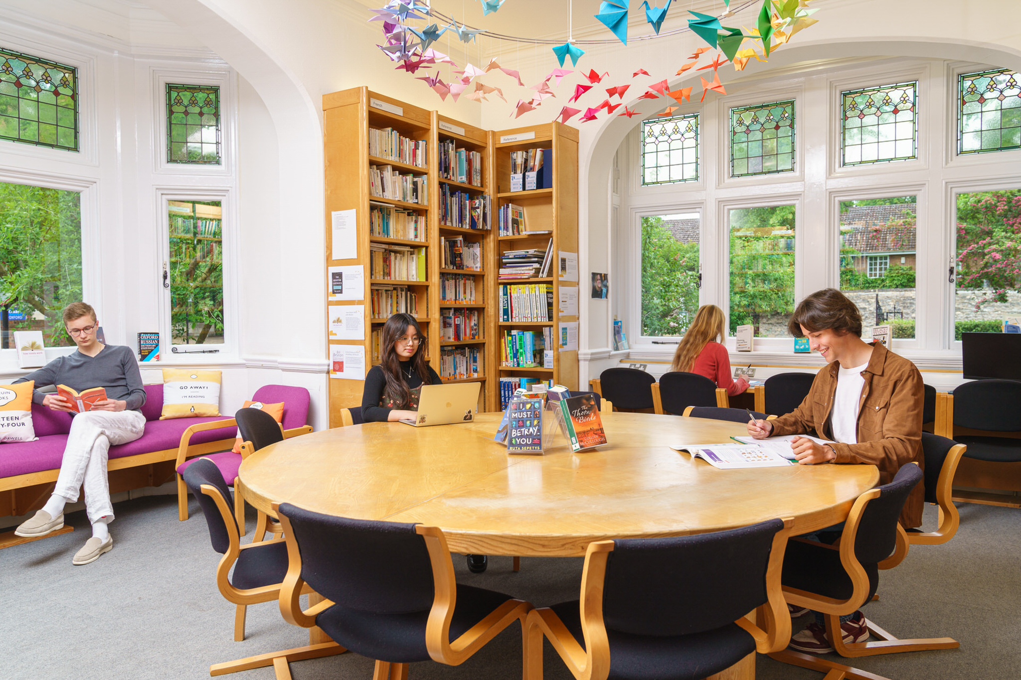 two teenage students in summer classroom lesson